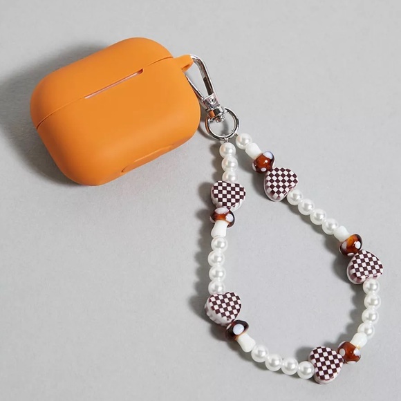 Urban Outfitters Handbags - NWT Urban Outfitters Orange Heart Bead AirPods Pro Case
